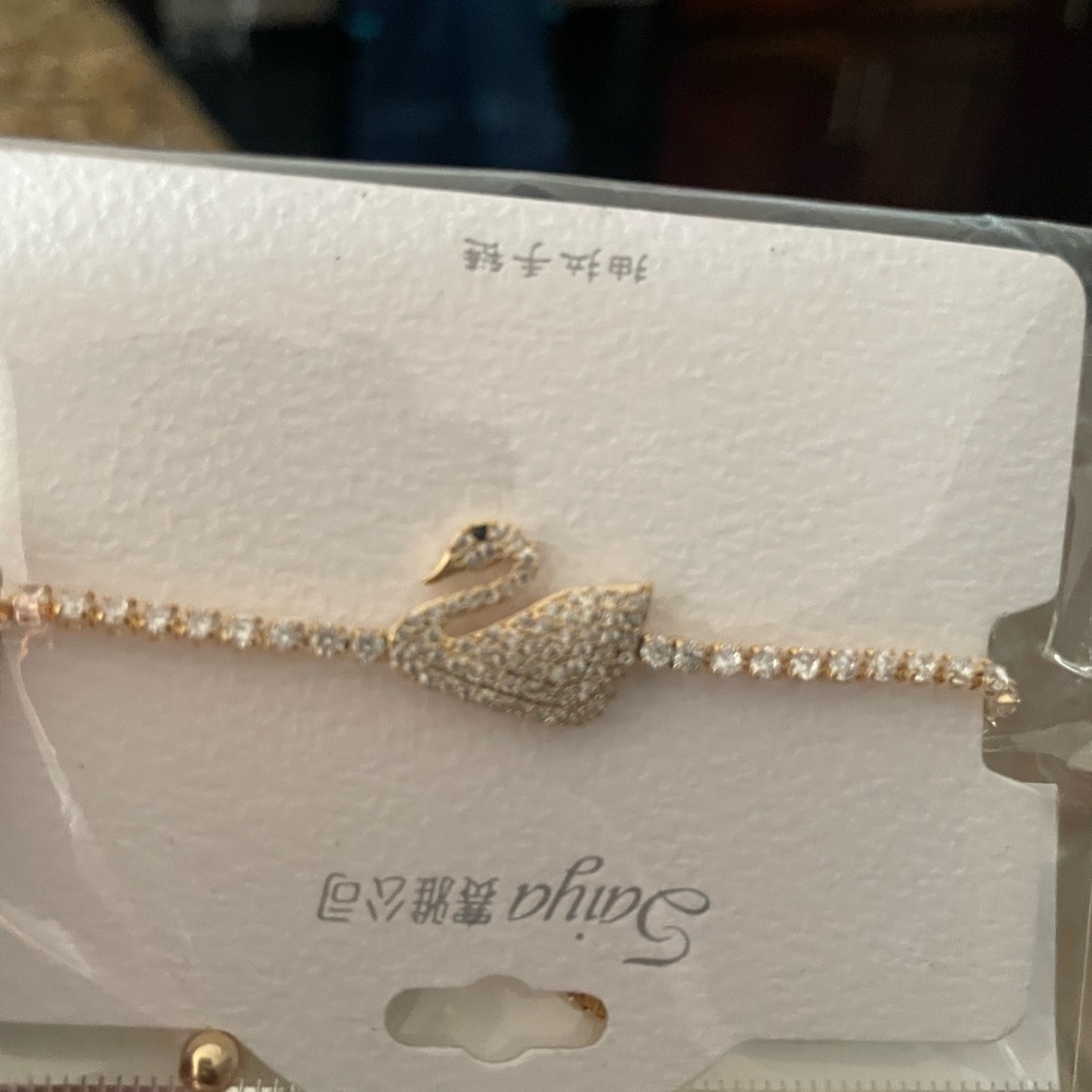 Elegant Gold Swan Bracelet and earrings